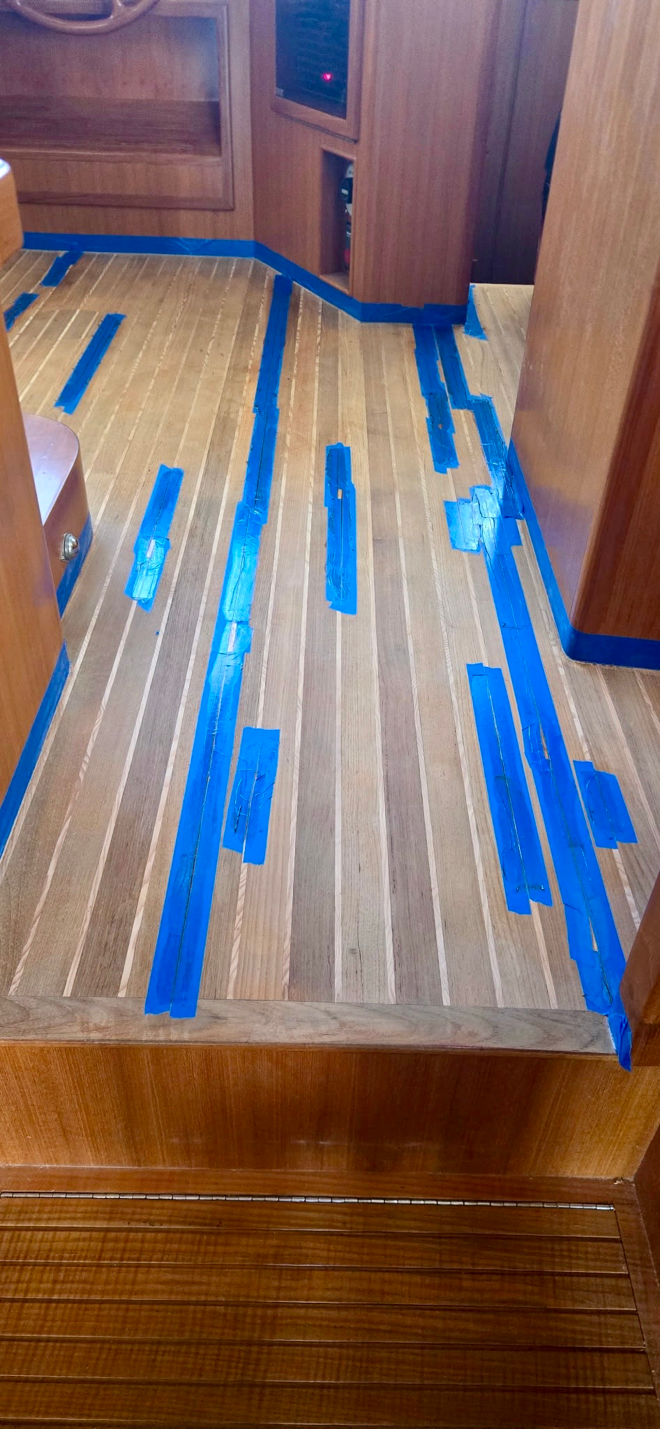 Pilot House Teak Flooring Preparation During Yacht Carpentry Repair Refinishing, Port Charlotte.